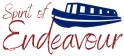 Spirit of Endeavour logo. Consisting of the words in script writing. "Spirit of" is above left alongside a drawing of a blue canal boat. Underneath is the word "Endeavour".