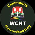 Wirral Community Narrowboat Trust logo. Front view of a colourful cartoon narrowboat, with the white lettering "WCNT" underneath. Slightly arched above is "Community" similarly arched below id "Narrowboating".
